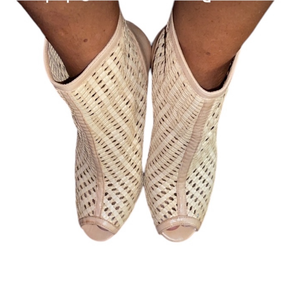 Schultz size 10  light tan or cream leather bootie  laser cut with back zipper